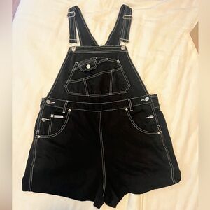 REVOLT vintage (circa 1990s) black overall shorts with white thread detail